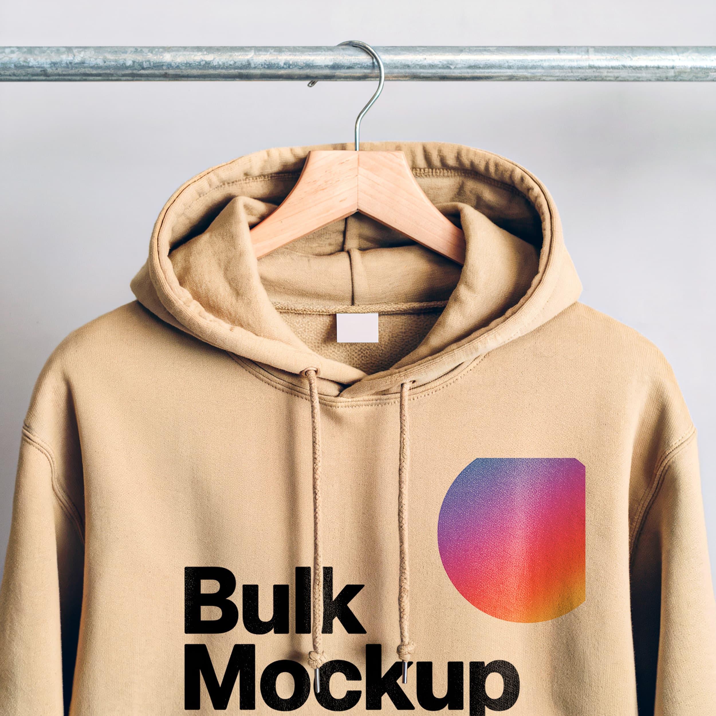Close-Up of Beige Hoodie on Hanger hoodie mockup preview